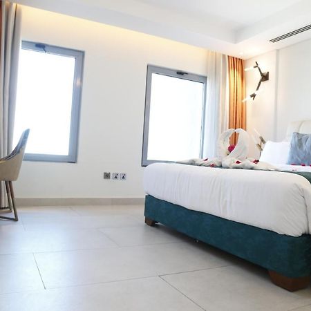 Waterfront Hotel Apartment Lusail Exterior foto A room at the hotel