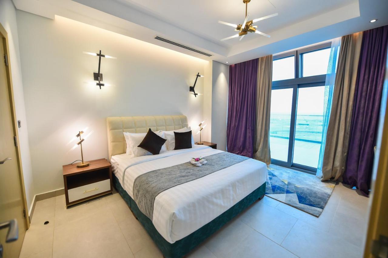 Waterfront Hotel Apartment Lusail Exterior foto A bedroom at the hotel