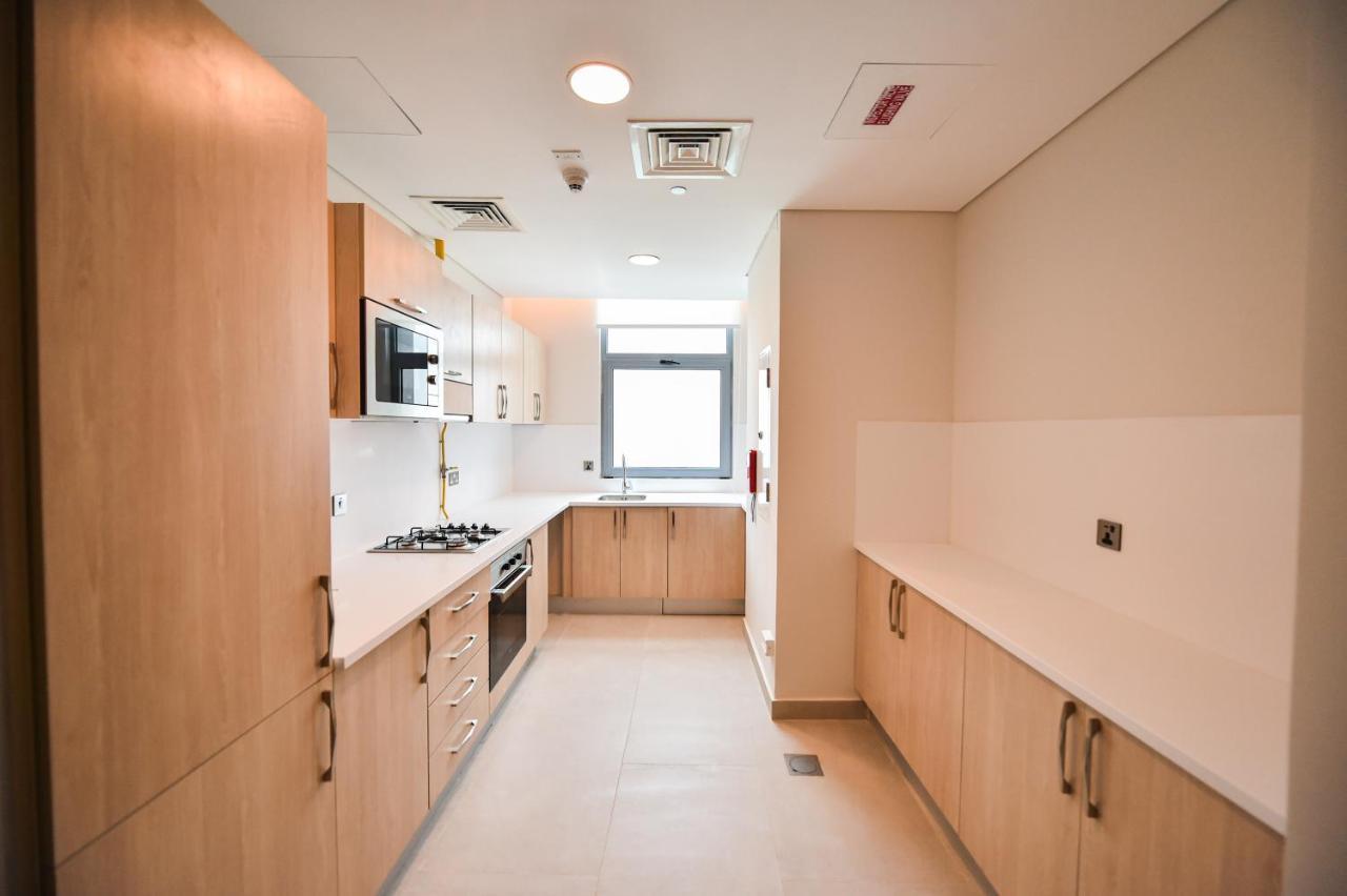 Waterfront Hotel Apartment Lusail Exterior foto A typical kitchen in a student flat
