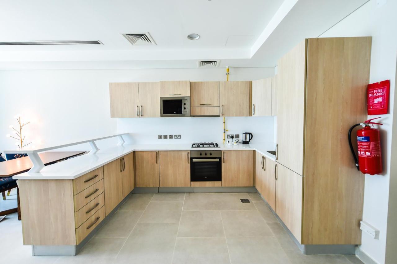 Waterfront Hotel Apartment Lusail Exterior foto A typical kitchen in a student residence hall