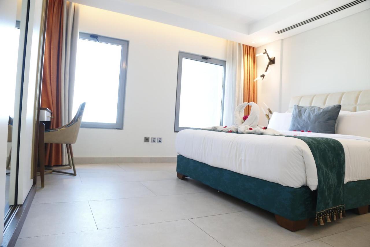 Waterfront Hotel Apartment Lusail Exterior foto A room at the hotel
