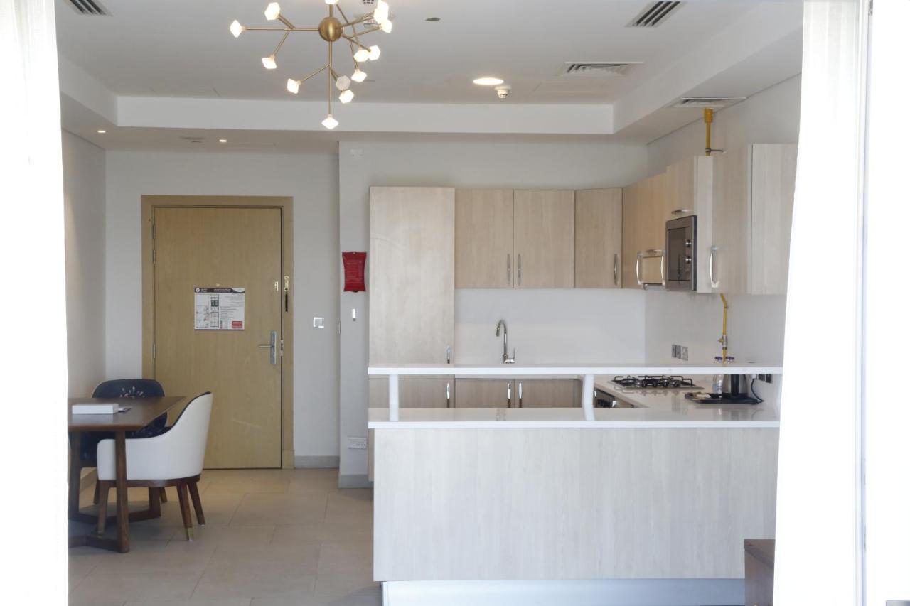 Waterfront Hotel Apartment Lusail Exterior foto A kitchen in a typical apartment