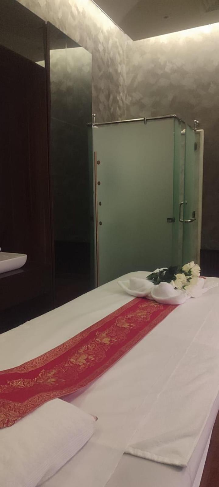 Waterfront Hotel Apartment Lusail Exterior foto A shower cubicle in a Thai spa